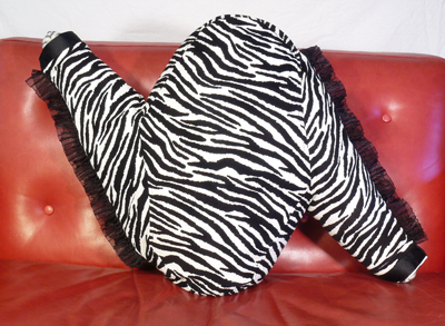 The Zeebra comfort cushion by ShapeShiftas. It’s a wild throw pillow and an adult stuffed animal, too!