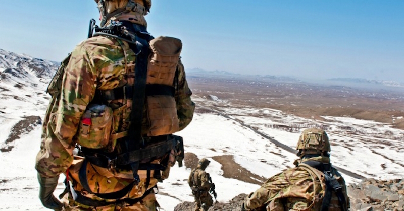 U.S. soldiers, members of the 3rd Stryker Brigade Combat Team, 2nd Infantry Division, take in the view of the horizon at a check point near Daab Pass in Shinkay district, Afghanistan, Feb. 25, 2012. (Photo: Program Executive Office Soldier/flickr/cc)