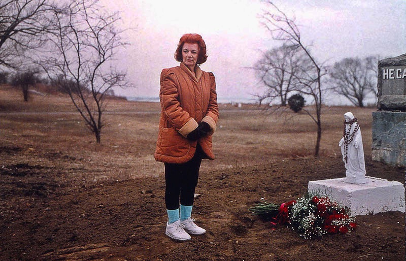 Vicki Pavia, whose baby is buried on Hart Island, on a specially arranged visit. ©1994 Joel Sternfeld