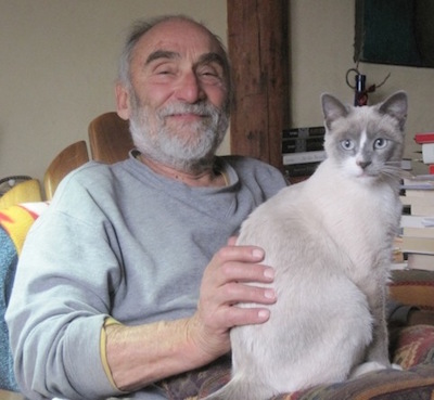 Emanuele Corso "looking like an old Sicilian," with "genius cat" Sheba