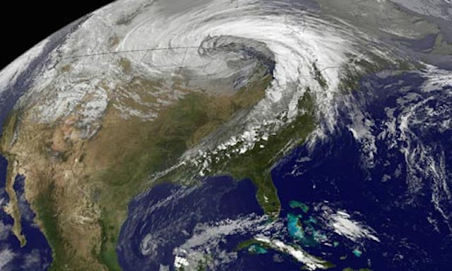 This Nasa Earth Observatory image shows a storm system circling around an area of extreme low pressure in 2010, which many scientists attribute to climate change. Photograph: AFP/Getty Images