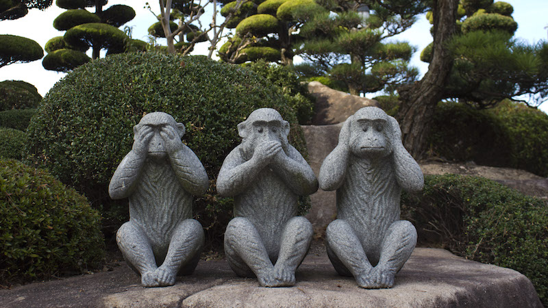 See no evil speak no evil hear no evil. Statue of the three wise monkeys in a Japanese garden on Innoshima Island. Japanexperterna.se