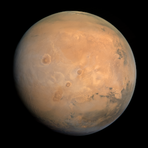 Mars in true color, taken by the Emirates Mars Mission on 30 August 2021, when Mars was in northern solstice. Kevin Gill from Los Angeles, CA, United States, CC BY 2.0 <https://creativecommons.org/licenses/by/2.0>, via Wikimedia Commons